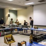 Visitors Examine the Historic Equipment