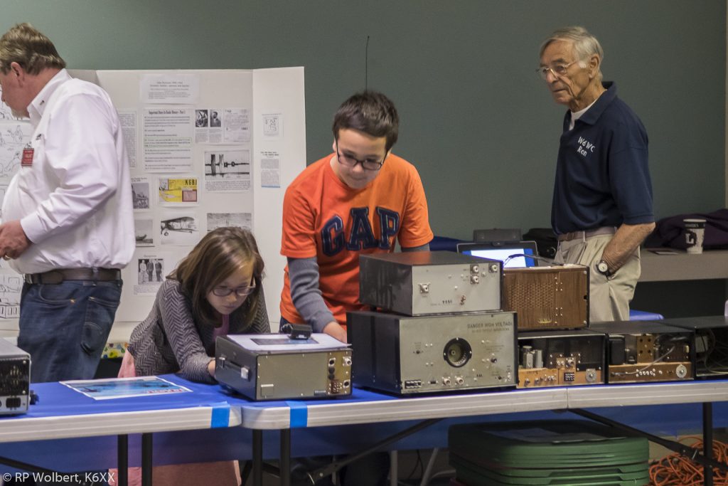 Visitors Examine the Historic Equipment